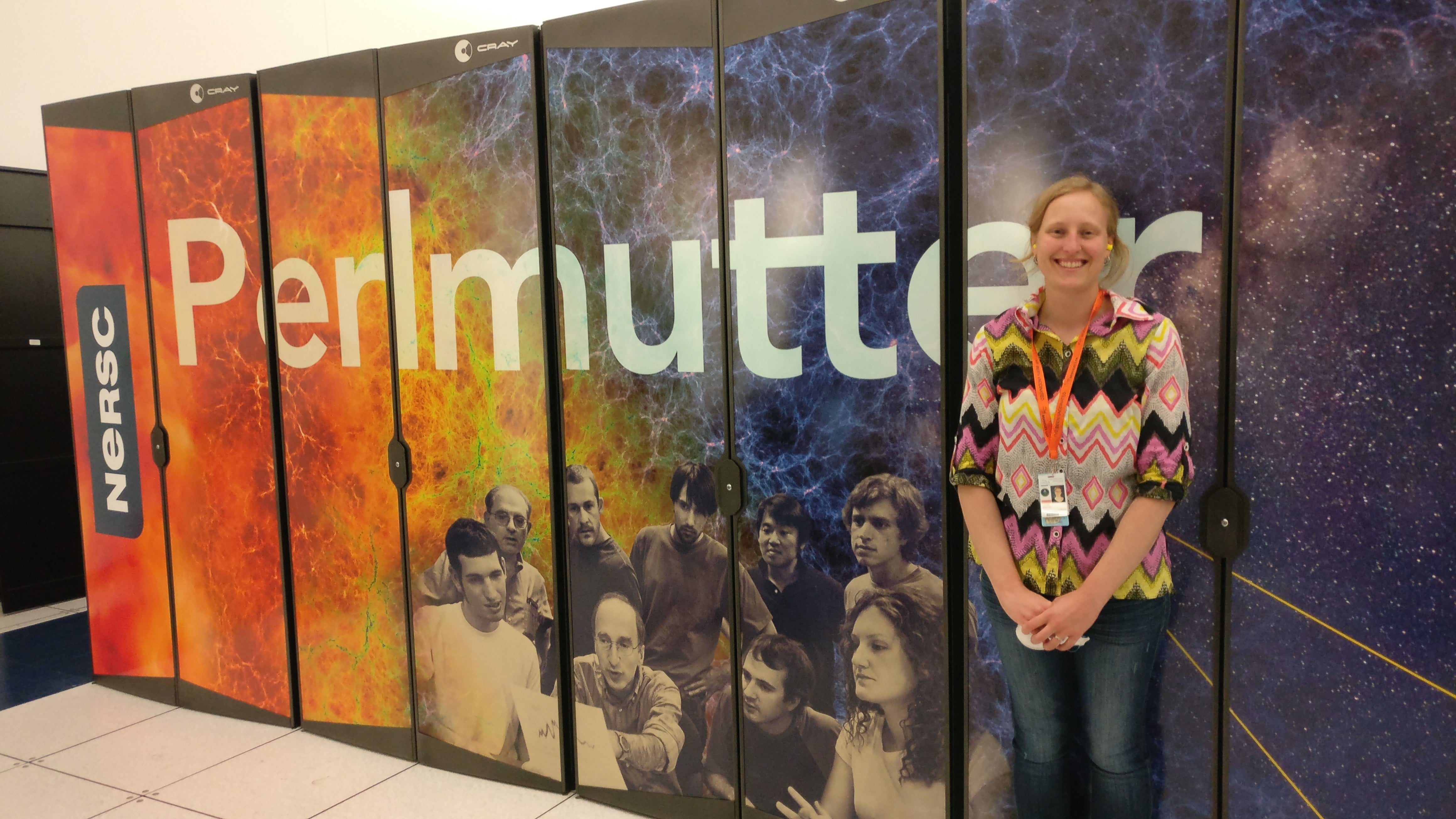 Laurie in front of NERSC's Perlmutter system