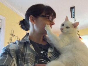 White cat with owner White cat with owner