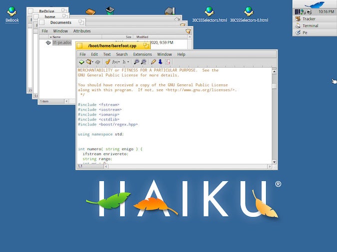 Blue HAIKU desktop with Pe editor buffer, a white box with gray text Blue HAIKU desktop with Pe editor buffer, a white box with gray text